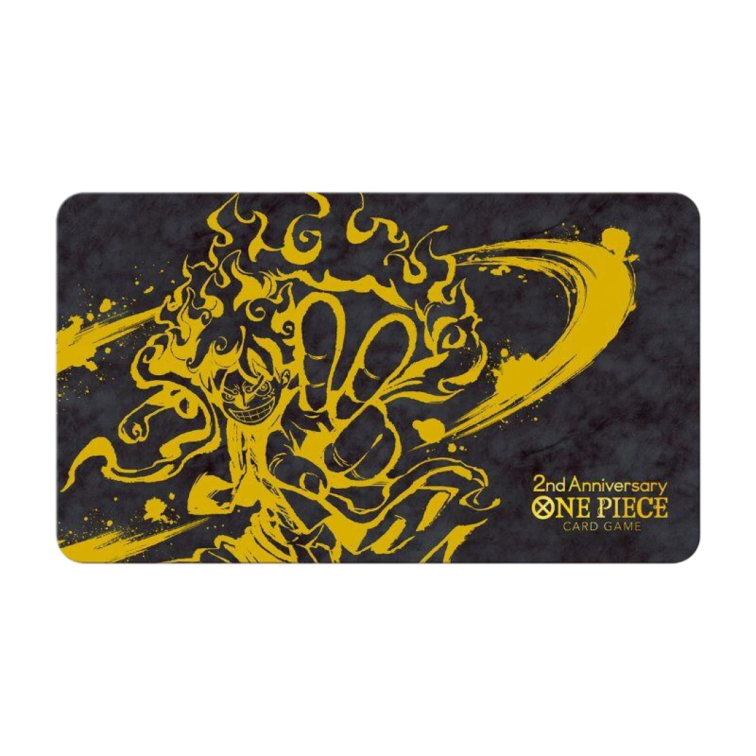Playmat in edizione limitata con illustrazione dorata di Luffy in Gear 5, incluso nel set del secondo anniversario.